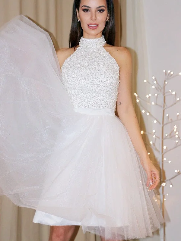 A-Line/Princess Sleeveless Halter Beading Tulle Short/Mini Homecoming Dresses